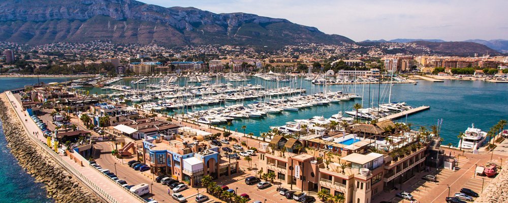 Dénia marina with Montgó behind it