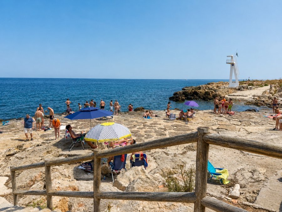 El Trampolí bathing area rocks and sea in Les Rotes, Dénia