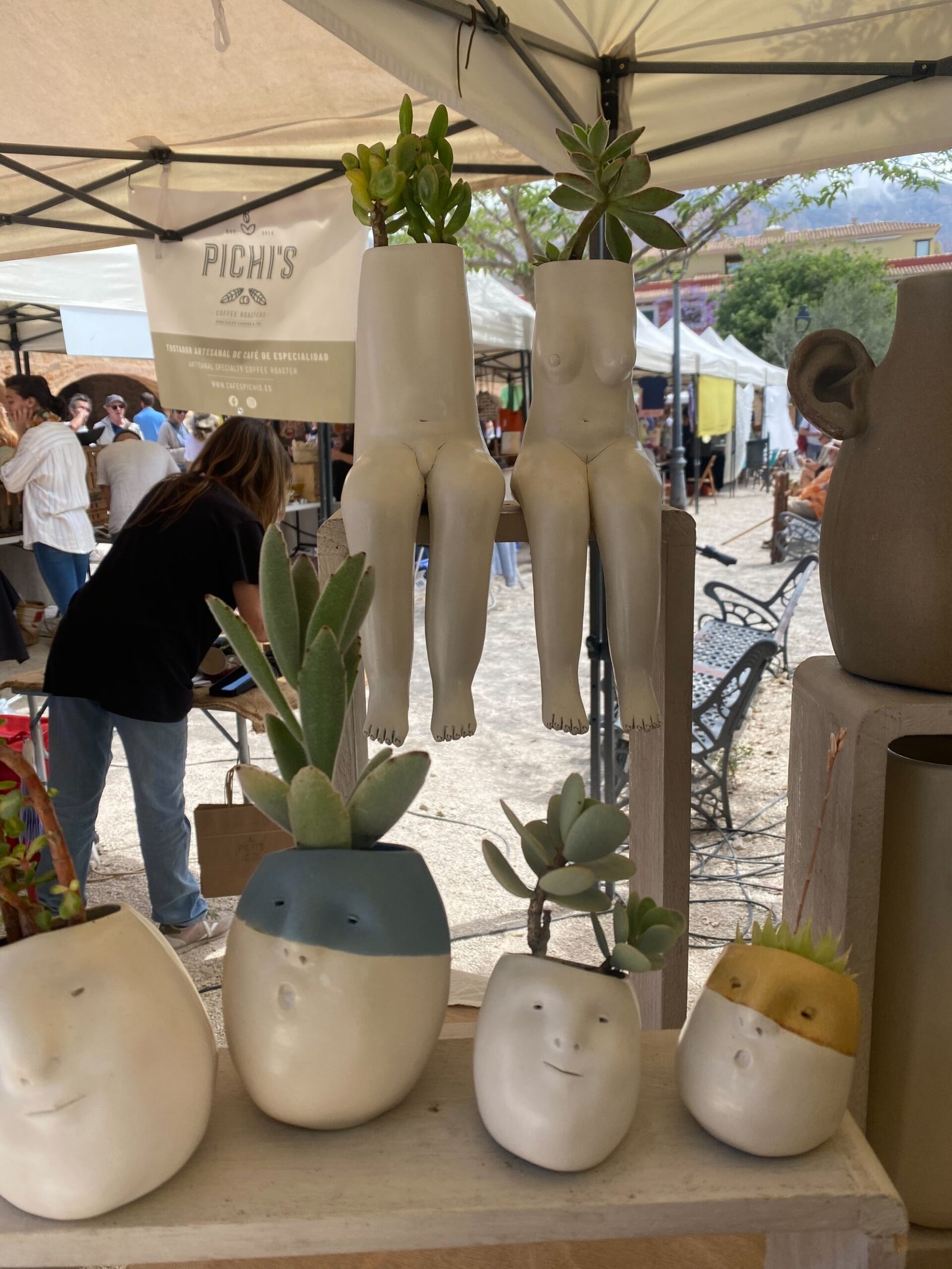 Ceramic planters and handmade gifts at a local market stall near Dénia